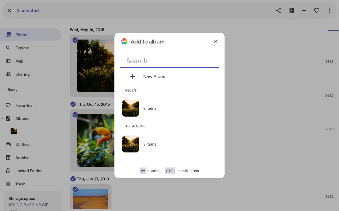 Three photos selected in Immich with the Add to album dialog open